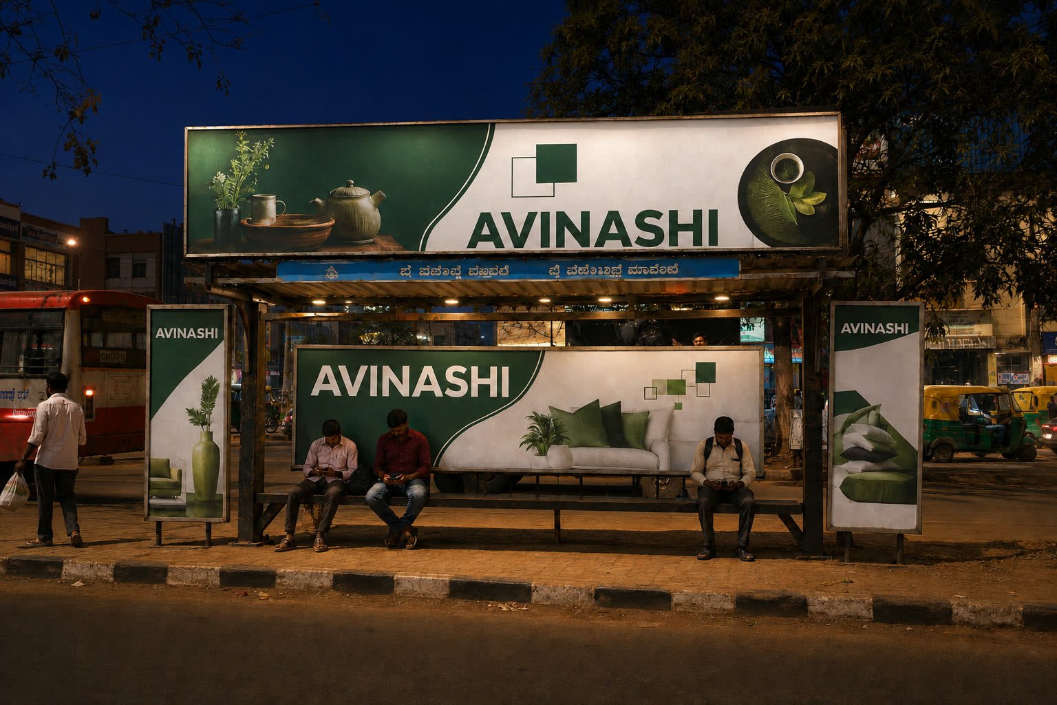 The same Hubballi bus shelter with illuminated panels at night