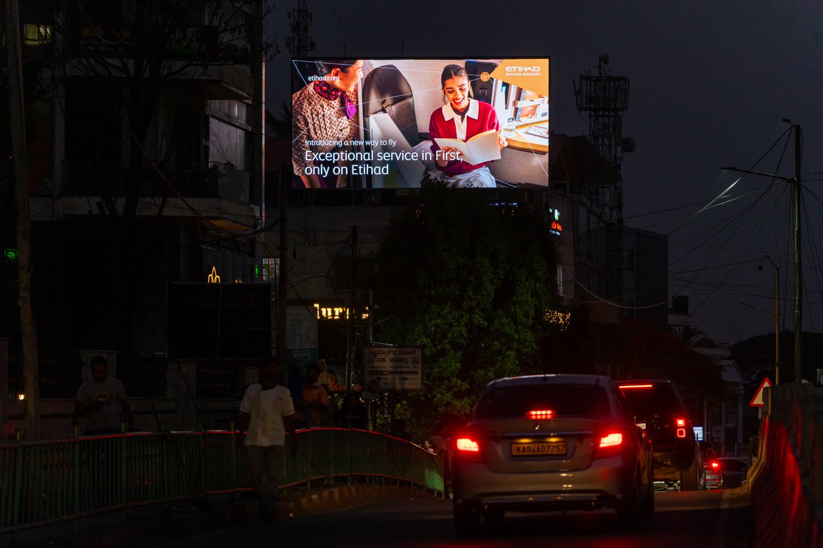 Etihad campaign on a Bengaluru LED display at night