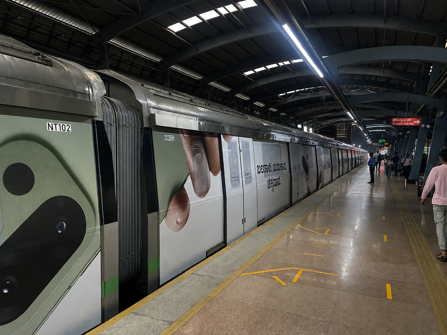 OnePlus Metro Train at Platform at Night