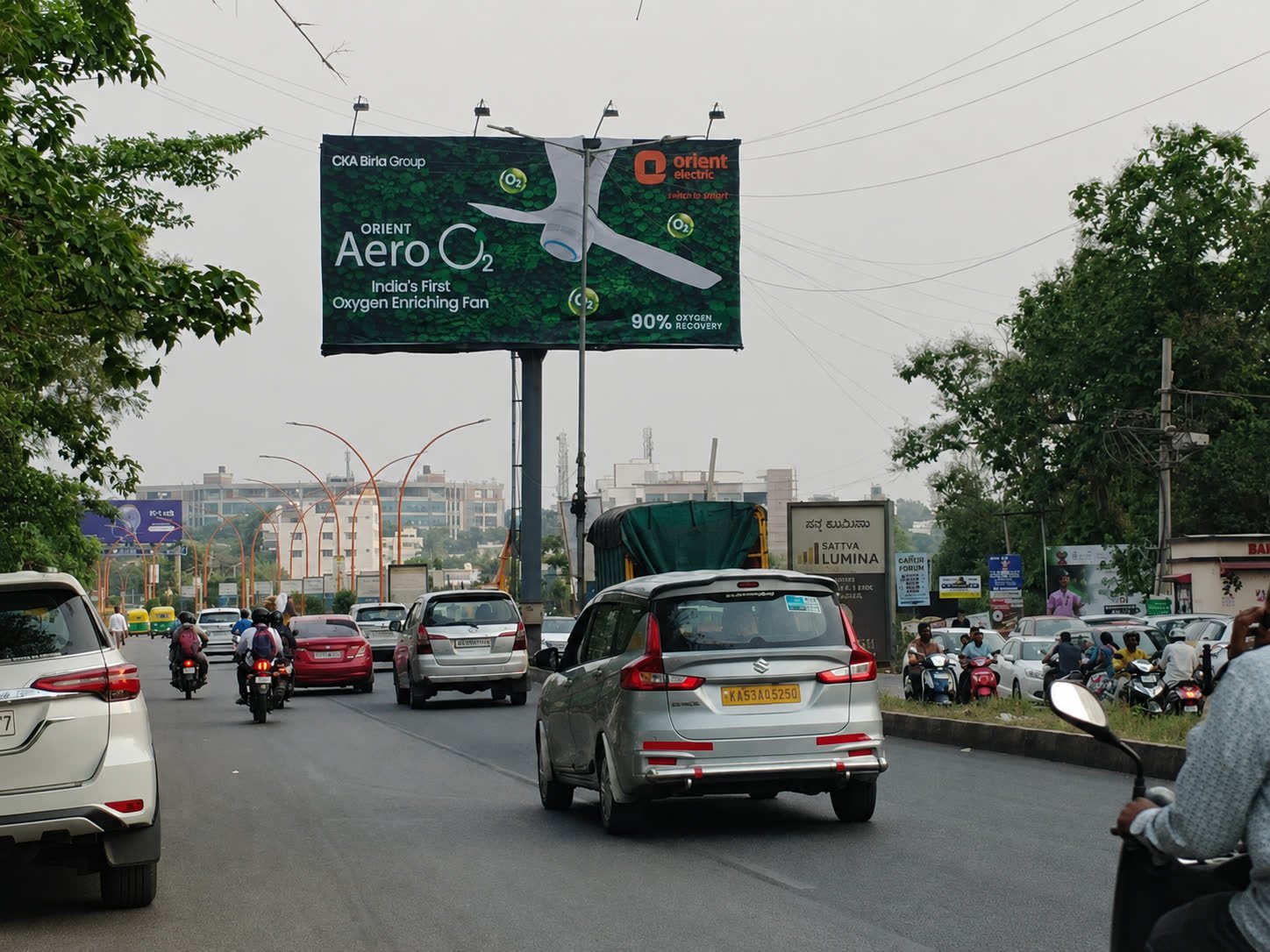 Unipole opposite Yelahanka Godrej Avenues toward BMSIT during the day