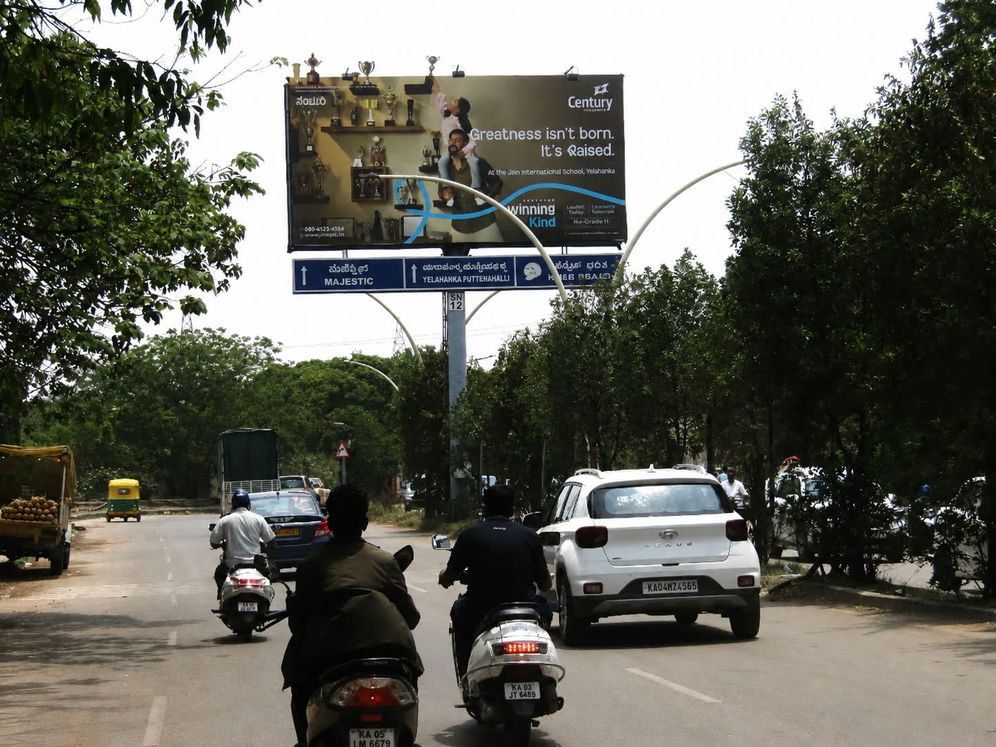 Unipole opposite Ramanashree Resort toward Dairy Circle during the day